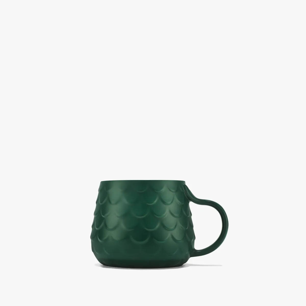 zelený hrnek s texturou rybích šupin