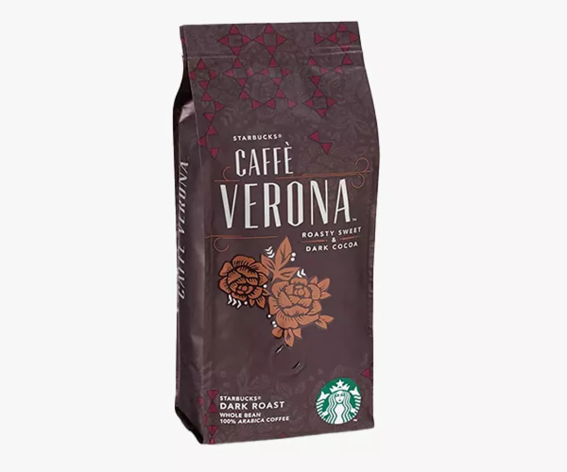 Dark brown package of starbucks whole bean coffee, white text on the package says "cafe verona". the package has a rose flower motif in the shape of a heart